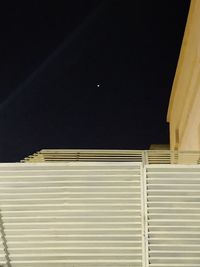 Low angle view of building against sky at night