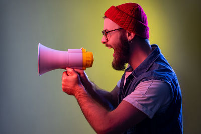 Close-up of man drinking coffee