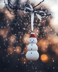 Snowman with a branch