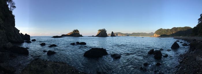 Scenic view of sea against clear blue sky