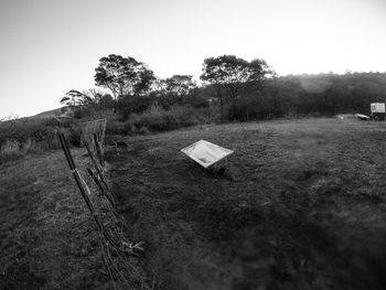 Scenic view of field against clear sky