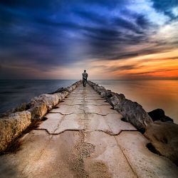 Scenic view of sea against sky at sunset