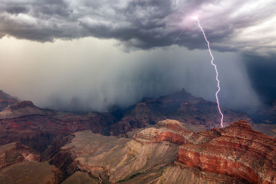 Lightning strikes from a thunderstorm over the grand canyon in grand canyon national park, arizona