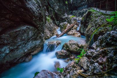 Scenic view of waterfall in forest