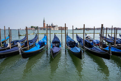 Gondolas at the piazzetta san marco in venice with san giorgio maggiore in the back