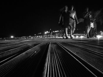 Surface level of railroad tracks at night