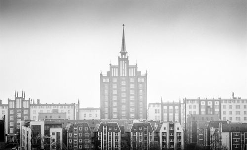 Low angle view of buildings against clear sky