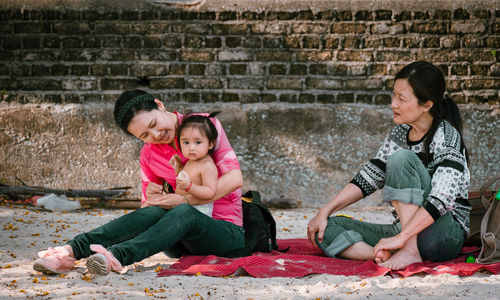 Portrait of baby girl with mother and grandmother