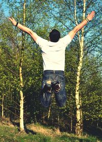 Woman jumping in park