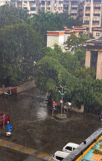 High angle view of wet street in city during rainy season