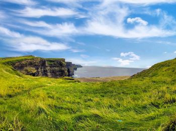 Scenic view of land against sky