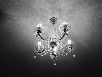 Low angle view of illuminated chandelier