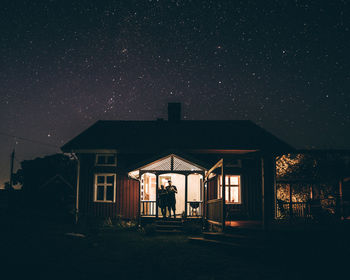 Low angle view of illuminated building at night