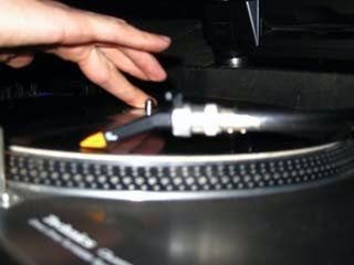 Close-up of hands playing piano