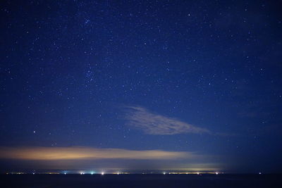 Scenic view of star field against sky at night