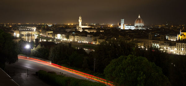 High angle view of light trails on road in city