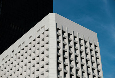 Modern and simple designed commerce building with patterned feature in admiralty, hong kong