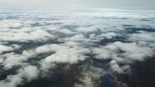 Aerial view of clouds over mountain