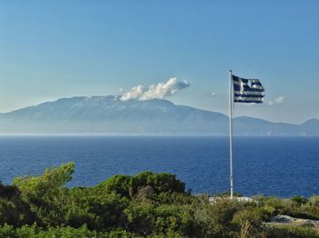 Scenic view of sea against blue sky