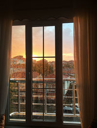 Buildings seen through glass window