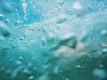 Full frame shot of water drops on window