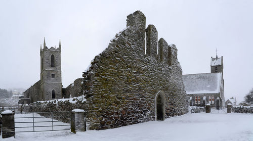 Castle against clear sky during winter