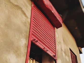 Low angle view of building against wall