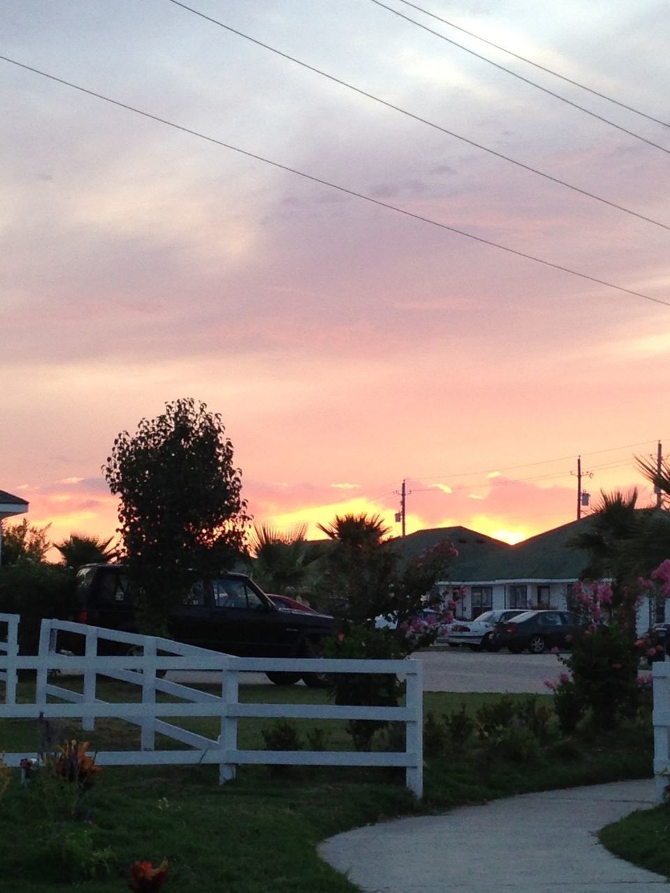 sunset, sky, architecture, built structure, building exterior, tree, power line, orange color, cloud - sky, house, electricity pylon, beauty in nature, cloud, silhouette, nature, scenics, cable, residential structure, connection, tranquility