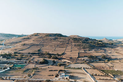 Aerial view of landscape against clear sky