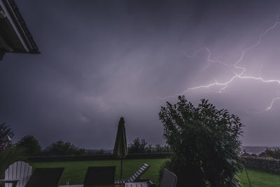 Low angle view of lightning against sky