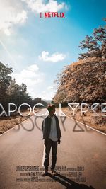 Rear view of man walking on road against sky