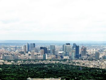 High angle view of city against cloudy sky