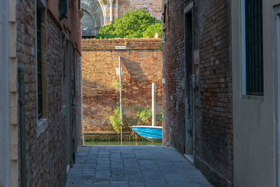 Alley amidst buildings in city