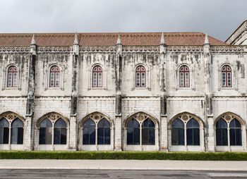 Arches with windows in stone monastery