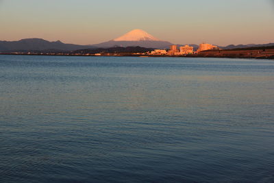 Scenic view of sea against sky at sunset