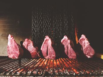 Close-up of meat cooking on barbecue grill