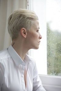 Portrait of young woman looking away