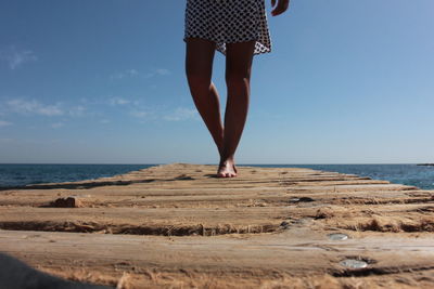 Woman standing on beach