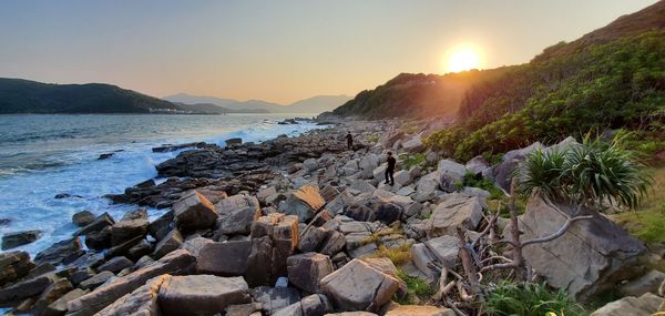 Scenic view of sea against sky during sunset