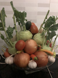 Close-up of fresh fruits and vegetables in container