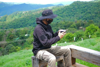 Young man using mobile phone