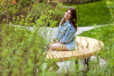 Woman sitting on grass