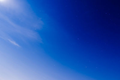 Low angle view of blue sky at night