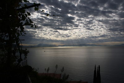 Scenic view of sea against sky at sunset