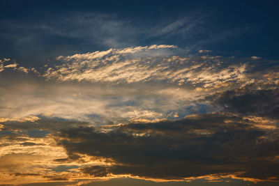 Low angle view of clouds in sky during sunset