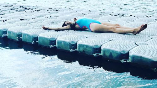 Young woman swimming in pool