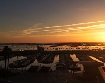 High angle view of swimming pool at sunset