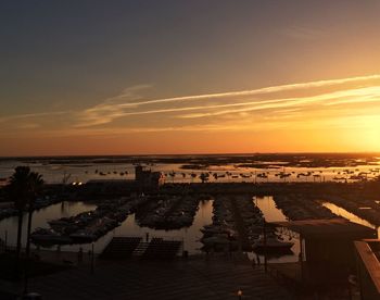 High angle view of swimming pool at sunset