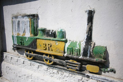 Close-up of old machinery on wall