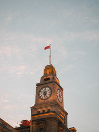 Shanghai  angle view of clock tower against sky